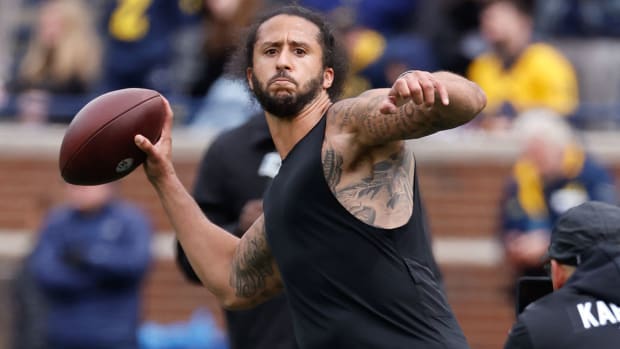 Colin Kaepernick passes during halftime at the Michigan Spring game at Michigan Stadium.